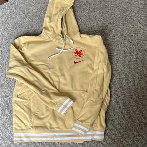 Nike Light Yellow Hoodie with Red Logo